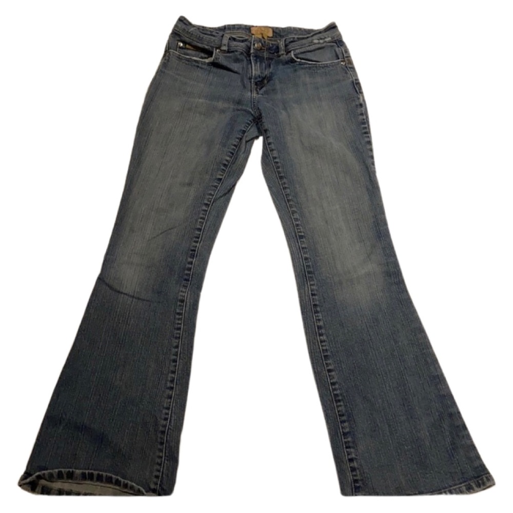Junior Candies Jeans. Medium wash jeans. Size: 5 with flared bottoms.